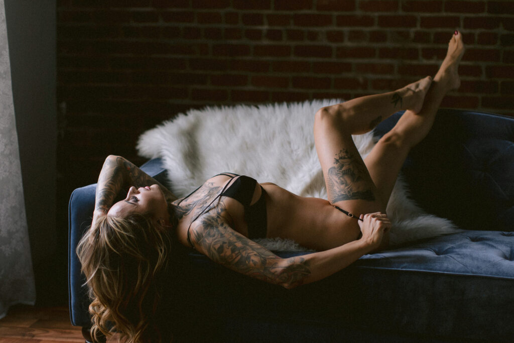 a boudoir photoshoot with a tattooed woman at a Midtown Sacramento Boudoir Photography studio